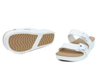A pair of white Cloud9 Bliss sandals with a drop-in platform footbed and two adjustable straps.