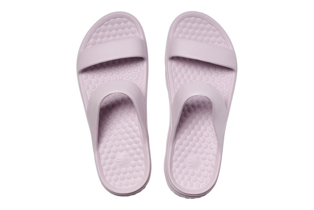 Pair of light purple slides on a white background