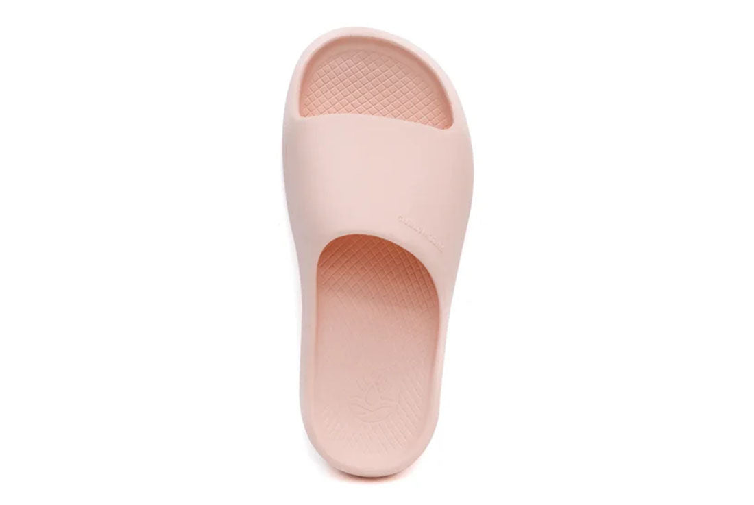 A pink unisex slide sandal with a contoured footbed and a simple, modern design.
