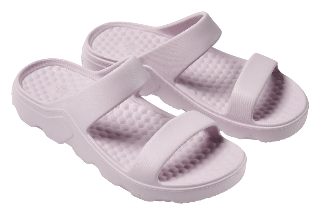 Pair of light purple sandals on a white background